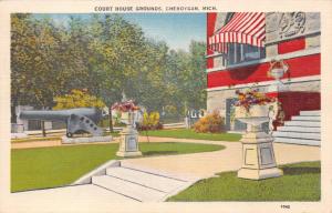 CHEBOYGAN MICHIGAN COURT HOUSE GROUNDS~LARGE CANON~STRIPED AWNING POSTCARD 1940