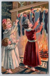 Christmas Children Filled Stocking At Fireplace Postcards I45