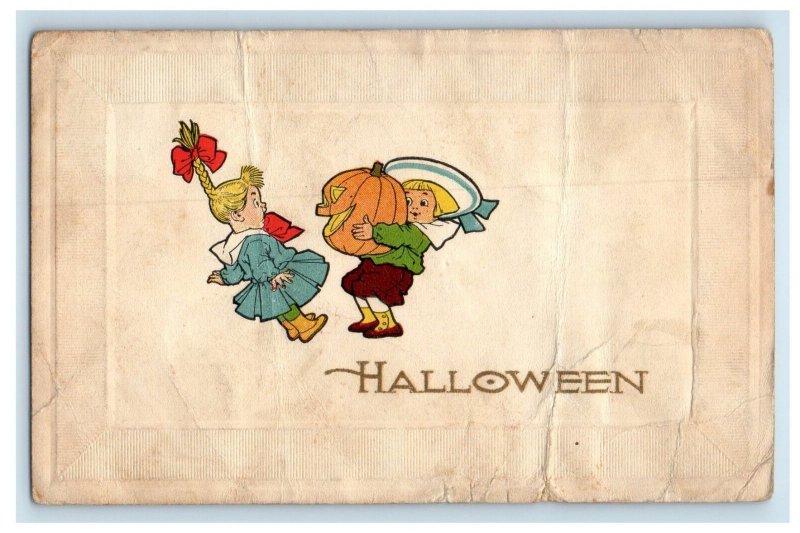 1925 Halloween Boy Scaring Girl with JOL Children Gibson Antique Postcard
