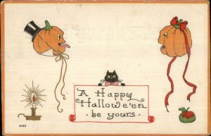 Halloween JOL Faces Sticks Tongue Out #7035 c1915 Postcard