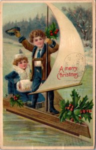 Christmas Postcard Boy and Girl on a Sail Boat Holly