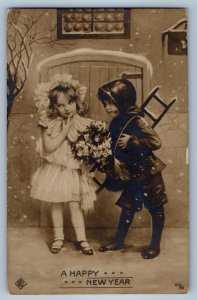 1910 New Year Children With Flowers Logan Indiana IN RPPC Photo Antique Postcard