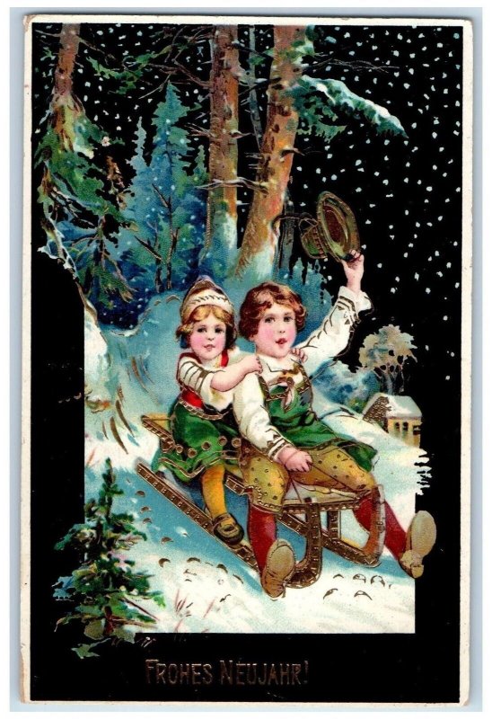 c1910's Happy New Year Boy Girl Sledding Winter Snowfall Gel Gold Gilt Postcard