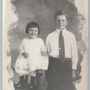 c1910s Cute Kids Portrait RPPC Young Man Boy Smile Little Girl Cushing, OK A196