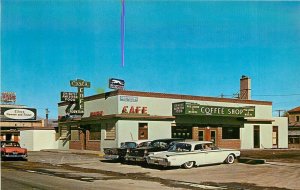 Postcard 1960s Nevada Elko Carl's Cafe Greyhound Bus Depot autos Mc Co 24-4915