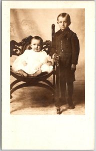 Children Sibling Kids Infant Sitting on a Chair Postcard