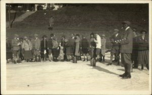 Curling? Ice Skates Crowd c1910 Real Photo Postcard