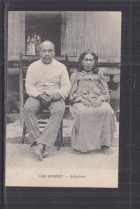 GILBERT ISLANDS, NATIVE MAN & WOMAN, c1910 ppc.,unused, writing on reverse.