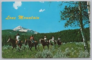 State View~Horse Riders & Panorama of Lone Mountains In Montana~Vintage Postcard