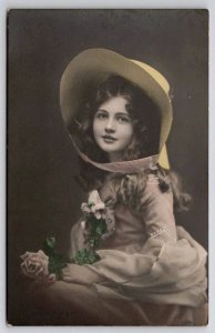 RPPC Beautiful Young Woman Tinted Photo Yellow Bonnet Pink Rose Postcard I45