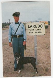 P2320,  vintage postcard  man and dog laredo texas pop. 59,350 unused