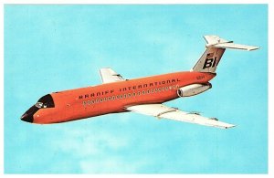 Braniff International BI Orange Plane In Sky Postcard