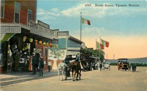 Postcard C-1910 Mexico Tijuana Street Scene Flags Eno horses MX24-1836