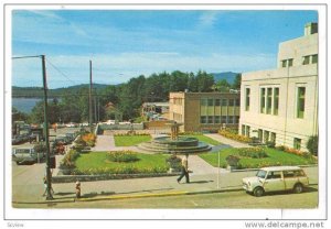 Fountain and flower gardens at side of City Hall, Canada, 40-60s