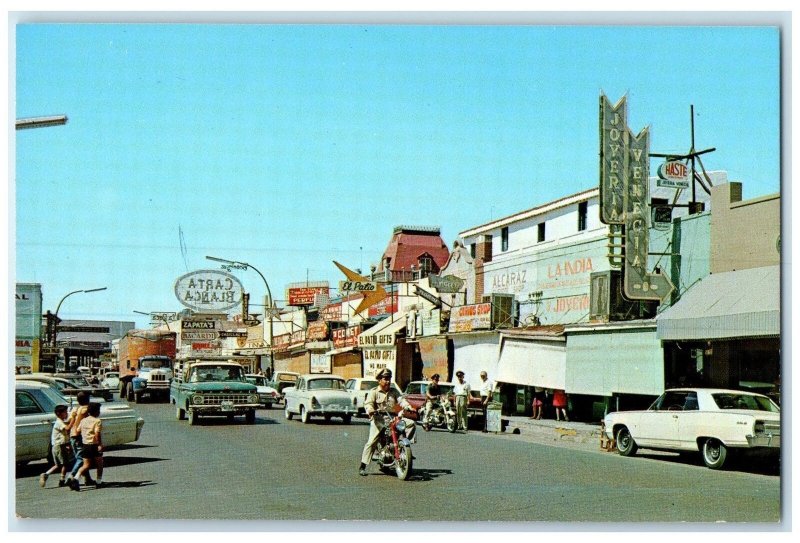 C1950 Nuevo Laredo's Guerrero Avenue Busy Street Along Border Texas TX Postcard