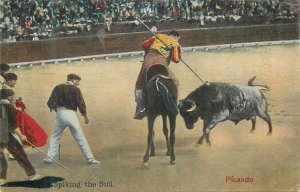 Toreador spiking the bull matadors Madrid corrida vintage postcard 