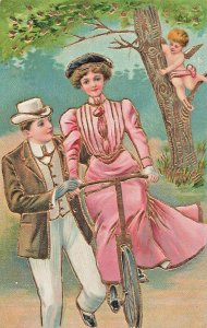 CUPID WATCHES ROMANTIC BICYCLE LESSON~1910s EMBOSSED GILT POSTCARD