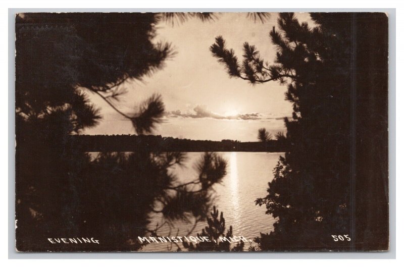 Postcard Evening View Manistique MIch. MIchigan RPPC Real Photo