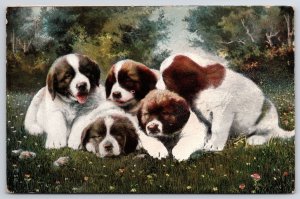 Five Puppies In The Flower Garden Laying Over The Grounds Postcard