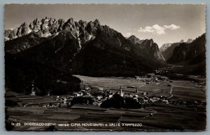 Postcard RPPC c1940s Valle D’Ampezzo Italy View Of The Dolomites And Village