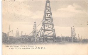 Rich Producing Field of Oil Wells 1908 postcard