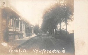 RPPC FRONT STREET NEW FREEDOM PENNSYLVANIA REAL PHOTO POSTCARD (c. 1905)