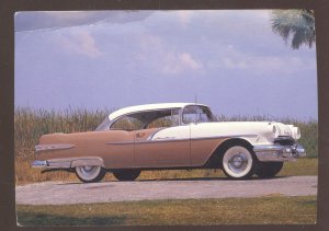 1956 PONTIAC STAR CHIEF CONVERTIBLE NATIONAL MOTOR MUSEUM ADVERTISING POSTCARD