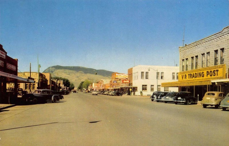 CODY, WY Street Scene VR Trading Post Wyoming Vintage Postcard ca 1950s