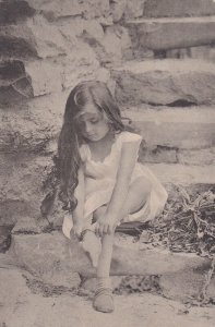 LIttle Girl putting her sock on, PU-1908; TUCK #1016