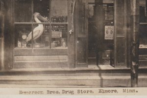 Elmore MINNESOTA RPPC c1910 EMERSON DRUG STORE Taxidermy nr Blue Earth Fairmont