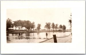 Bathing On The Lake Forest Trees In The Distance RPPC Real Photo Postcard