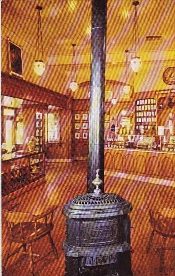 Pot Bellied Stove And Hanging Chandeliers Set The Mood Of Upjohns Old Fashion...