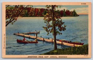 Greetings From East Jordan Michigan~Lake~Dock~Canoe Boats~Linen 1940s Postcard