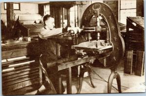 Old Sturbridge Village - printer using hand set type operating a flat bed press