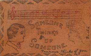 1907 Leather Postcard; Young Couple, Musical Notation, Someone Thinks of Someone