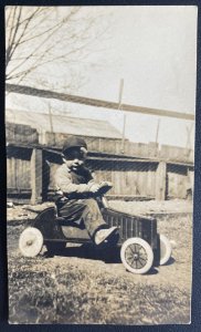 Mint USA Real Picture Postcard Boy driving an Old toy car