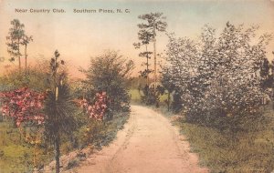 NEAR COUNTRY CLUB SOUTHERN PINES NORTH CAROLINA HAND COLORED POSTCARD 1924