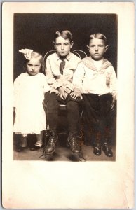 Kids Children Toddler Photograph Siblings Sitting on Chair RPPC Postcard