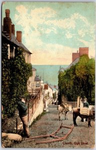 Clovelly High Street England Houses Residences Men Riding Horses Postcard