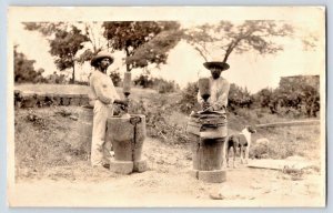 PUERTO RICO~PILANDO CAFE-GRINDING GRAIN~ATTILIO MOSCIONIS IMAGE REAL PHOTO PSTCD