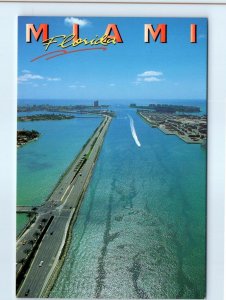 Postcard - An aerial view of one of the many causeways in and around Miami, FL