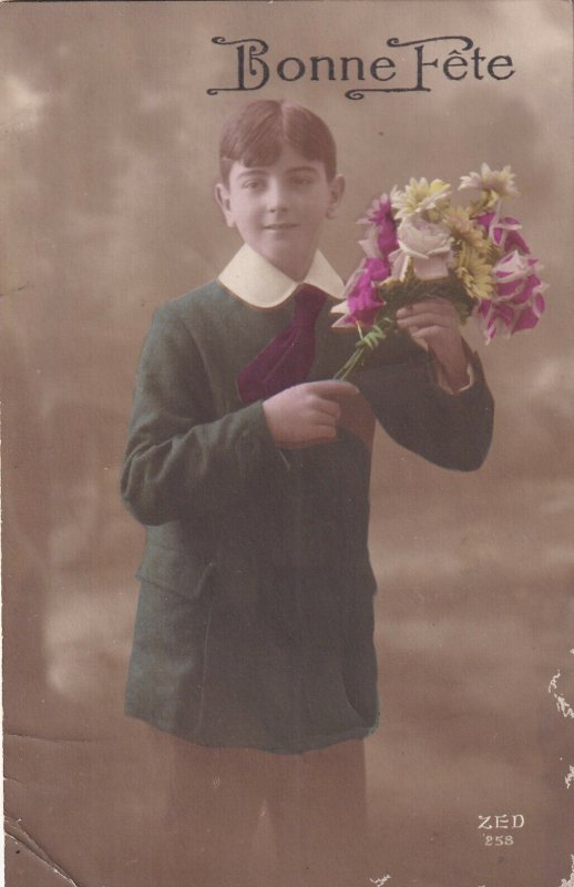 RP: BIRTHDAY, 1900-10s; Young Boy holding bouquet of flowers