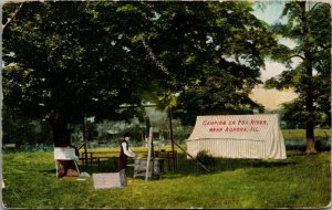 Aurora Illinois~Camping on Fox River~Man at Cook Stove~Striped Tent~1910 PC 