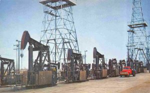 Oil Well Donkey Pumps US 101 Highway Huntington Beach California postcard