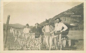 C-1910 Fisherman numerous catch of day recreation RPPC Photo Postcard -