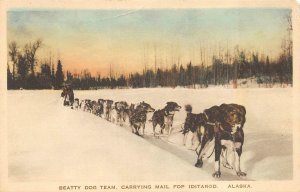 BEATTY DOG TEAM CARRYING MAIL FOR IDITAROD ALASKA HAND COLORED POSTCARD (c.1910)