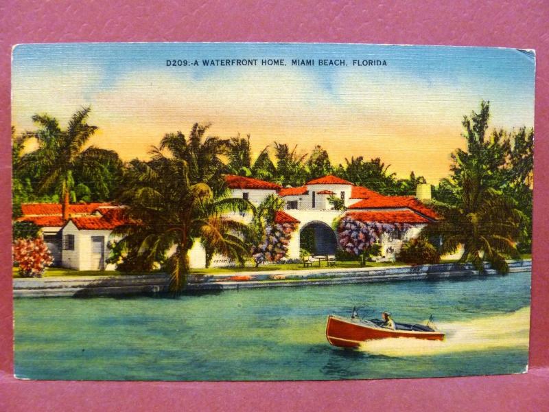 Postcard FL Miami A Waterfront Home Speedboat