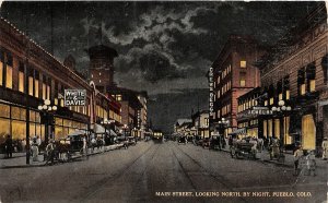 J10/ Pueblo Colorado Postcard c1910 Main Street Night Stores Jewelry 111