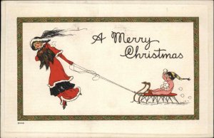 Christmas Pretty Woman Pulls Sled Child Snowballs Embossed c1900s-20s Postcard