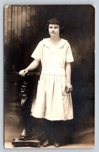 RPPC Lady in White Dress Next to Carved Table AZO 1918-1930 VTG Postcard 1318